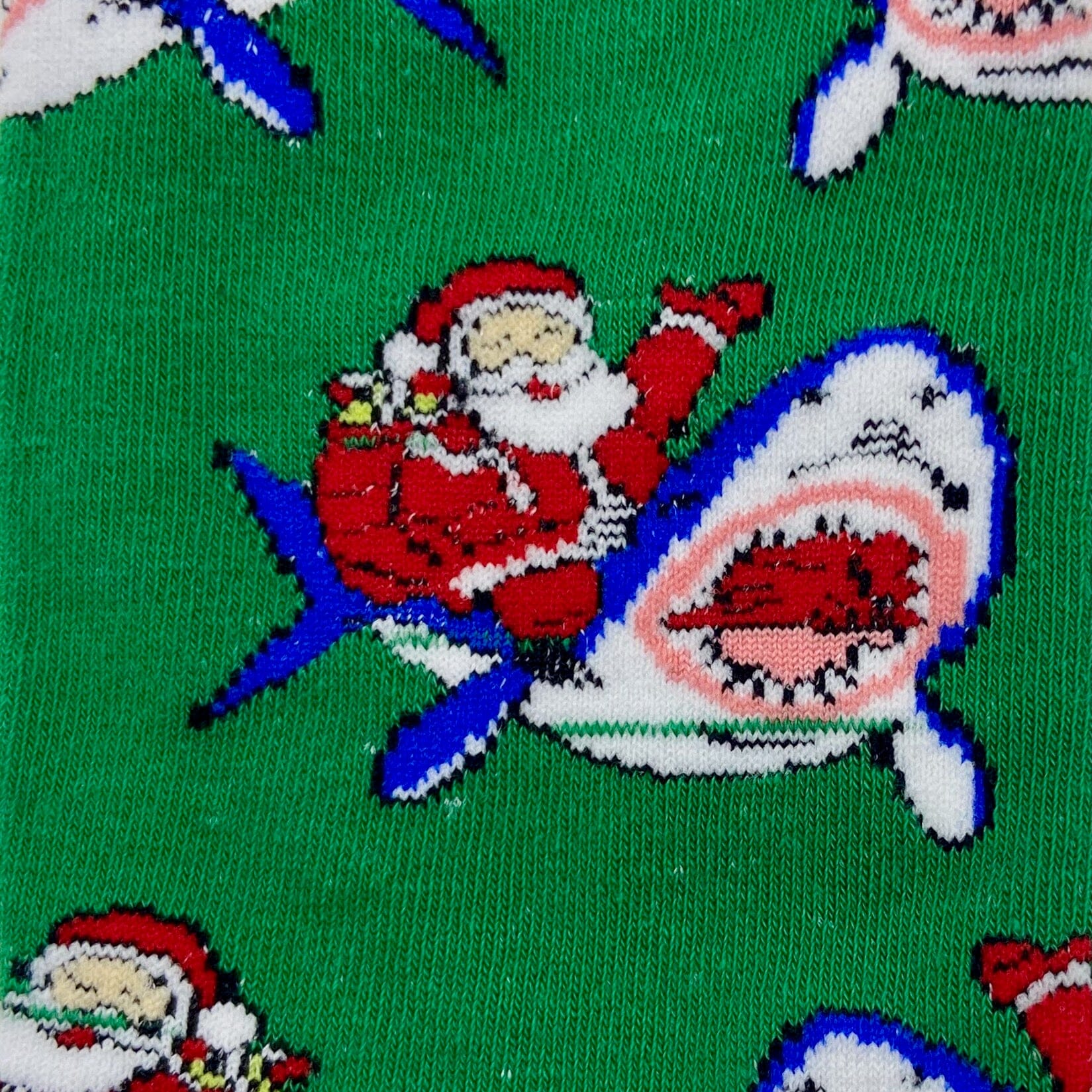 Christmas Themed Santas Riding Sharks Patterned Novelty Socks in Green