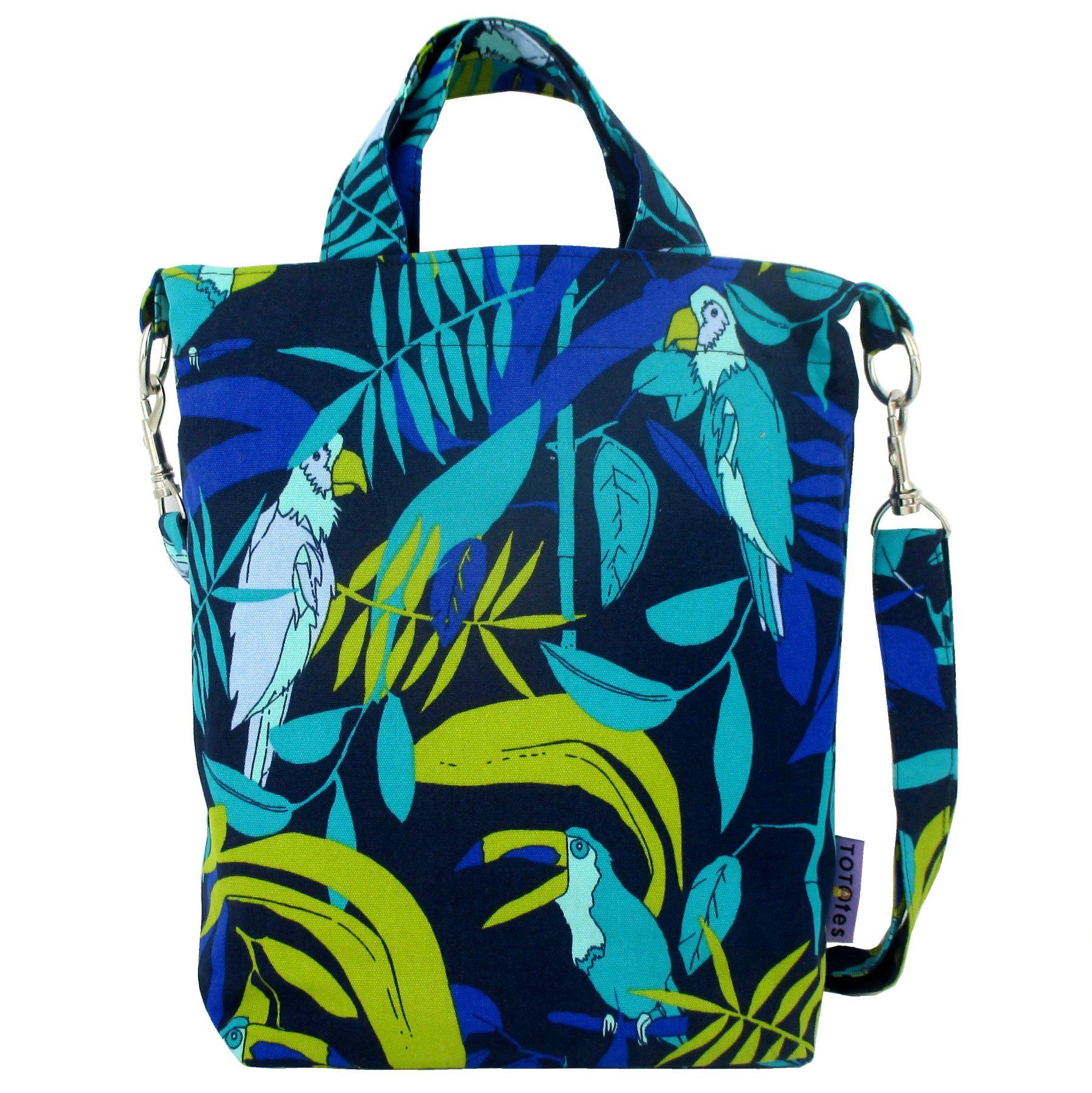 This jungle inspired bag features a blue green print made up of parrots and toucans against tropical leaves in the background.