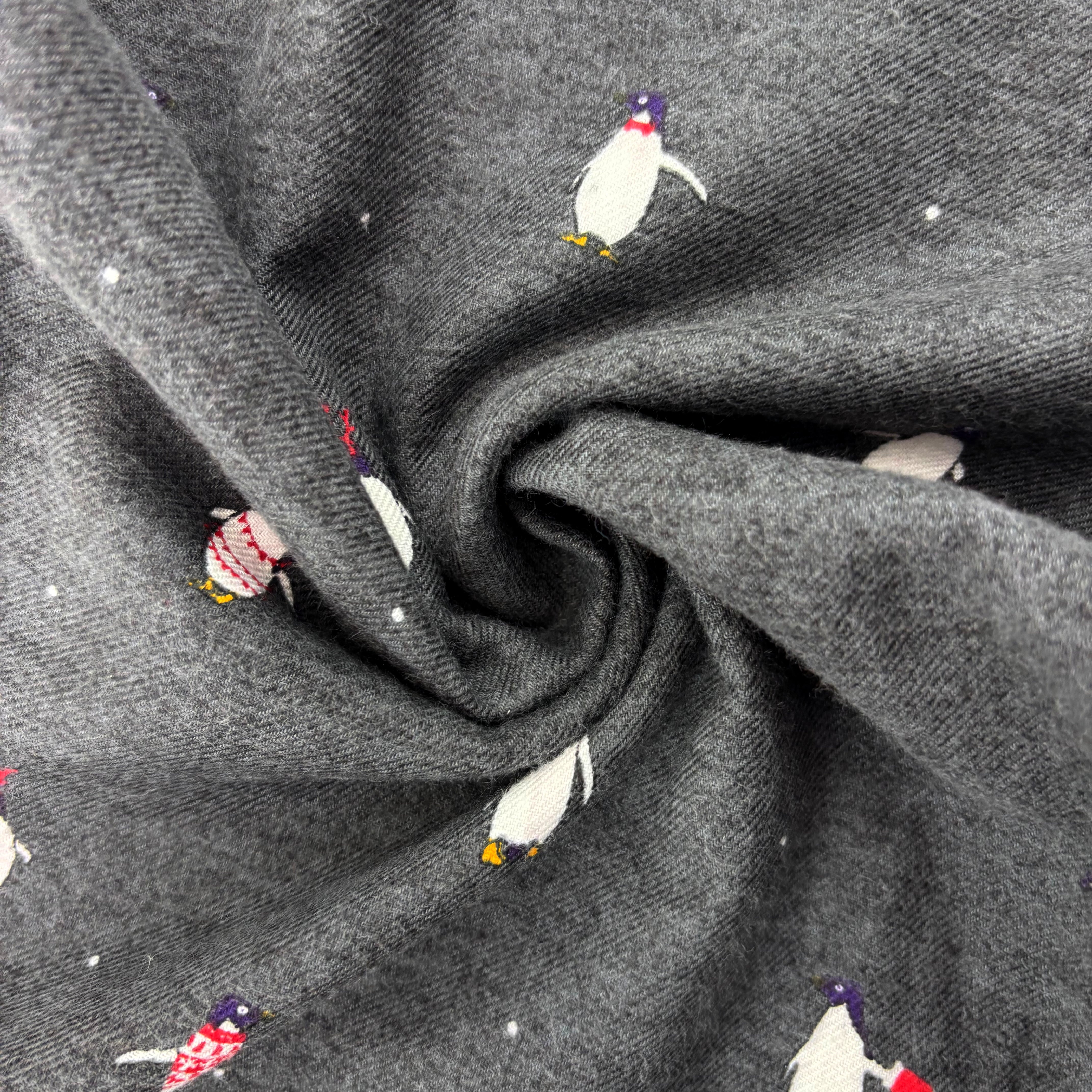 Gray fabric with  classic penguin pattern all over