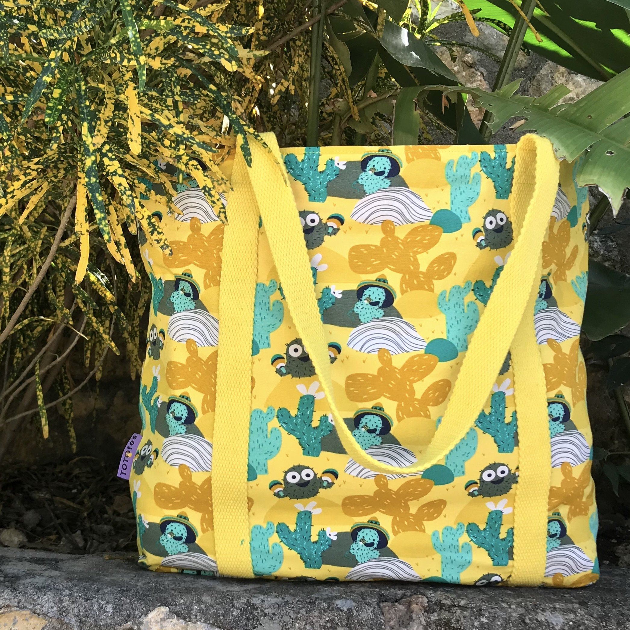 Embrace nature and the fun loving summer vibes with this bright yellow cactus print shopper bag! Just remember, if you do find yourself in the desert don’t go trying to drink water from any random cactus you see because chances are it’ll just give you some seriously bad indigestion! So stay hydrated, grab this awesome bag and go out there and have a blast!